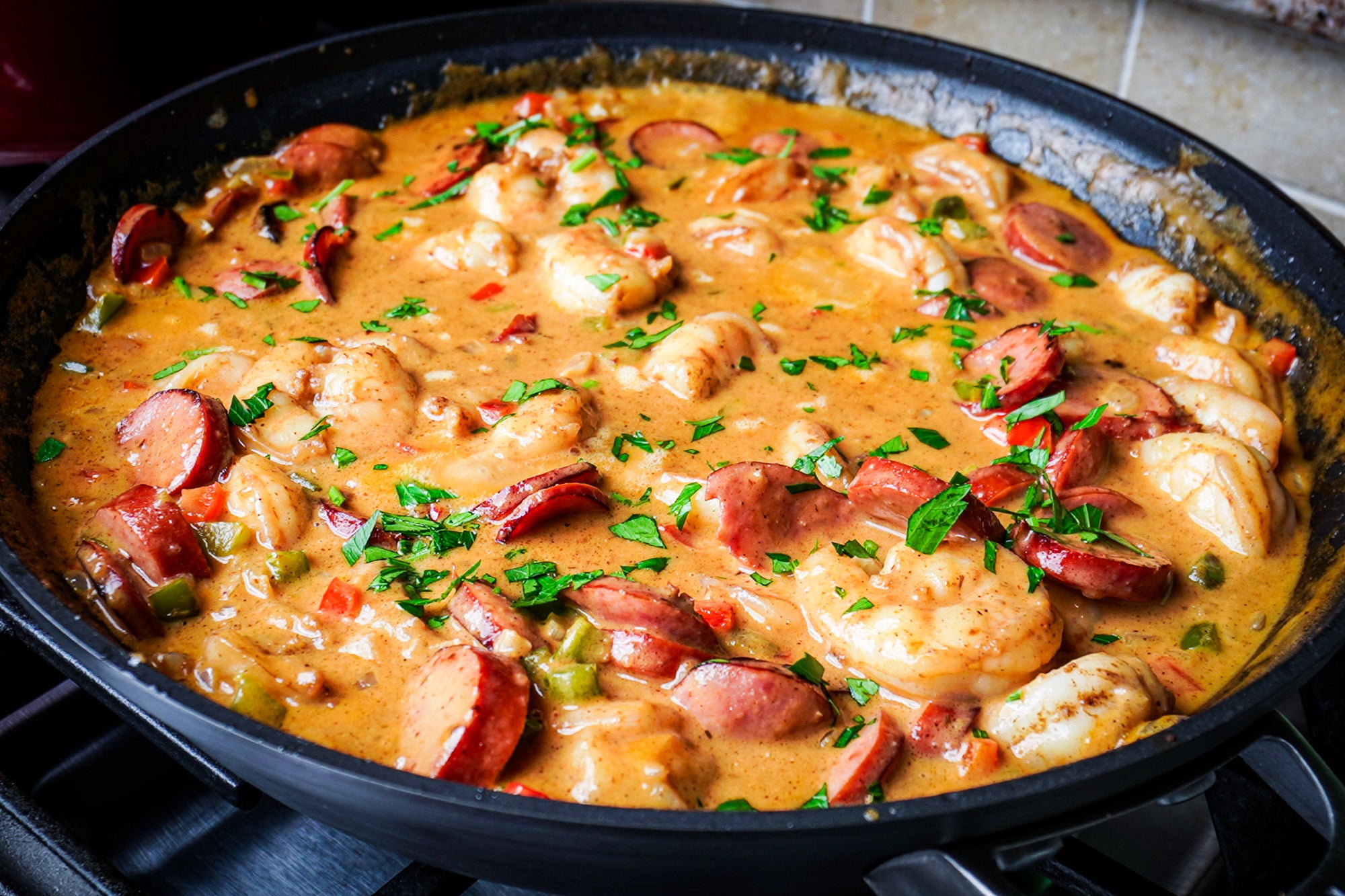 shrimp and sausage étouffée in a sauce pan 